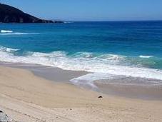 Surfear Galicia reto ponerse tabla
