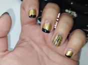 Diseño uñas negro dorado